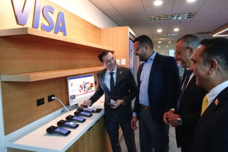 TTIFC CEO John Outridge, second from left, showcases the new National Payments Innovation Company T&T’s digital platform to Parliamentary Secretary in the Ministry of Trade, Investment and Tourism Neil Gosine, left, Minister of Planning, Economic Affairs and Development and Minister in the Ministry of Finance, Kennedy Swaratsingh and NLCB chairman Ken Emrith during the official launch of the company held at Level 15 International Financial Centre Waterfront, Port-of-Spain yesterday.